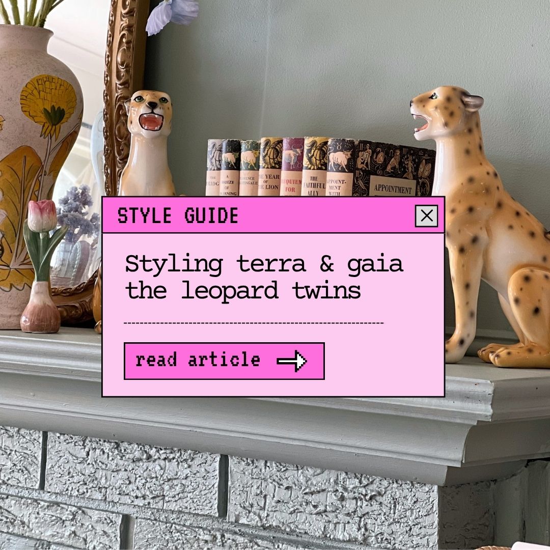 Mantlepiece Symmetry with Terra and Gaia the Leopard Statues