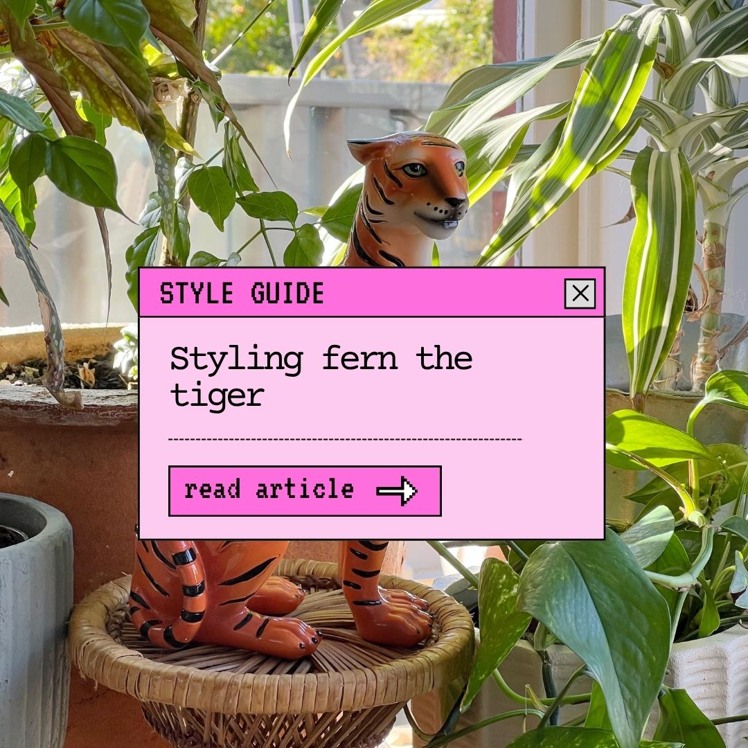 Amongst the Plants with Fern the Tiger Statue