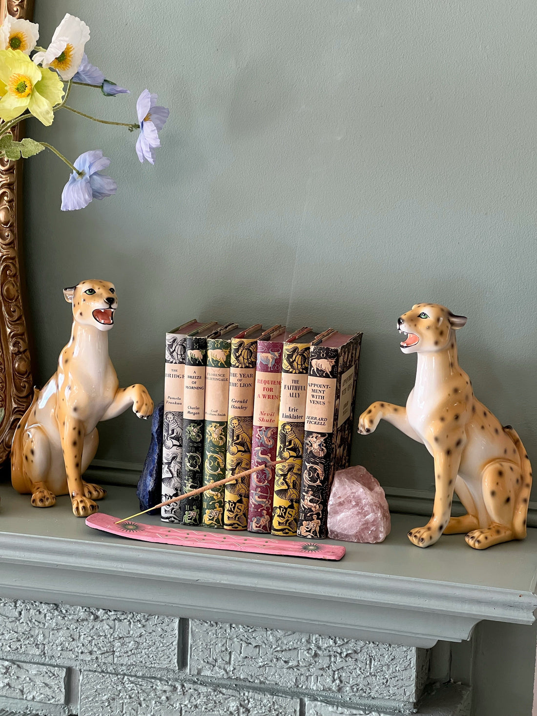 Mantlepiece Symmetry with Terra and Gaia the Leopard Statues