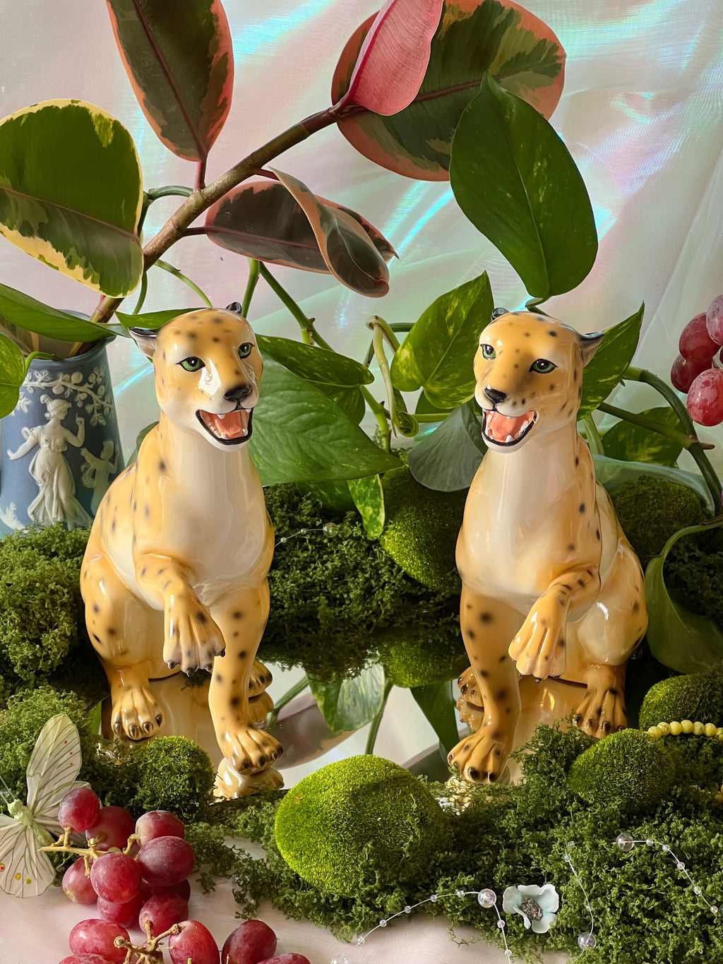 matching leopard statues