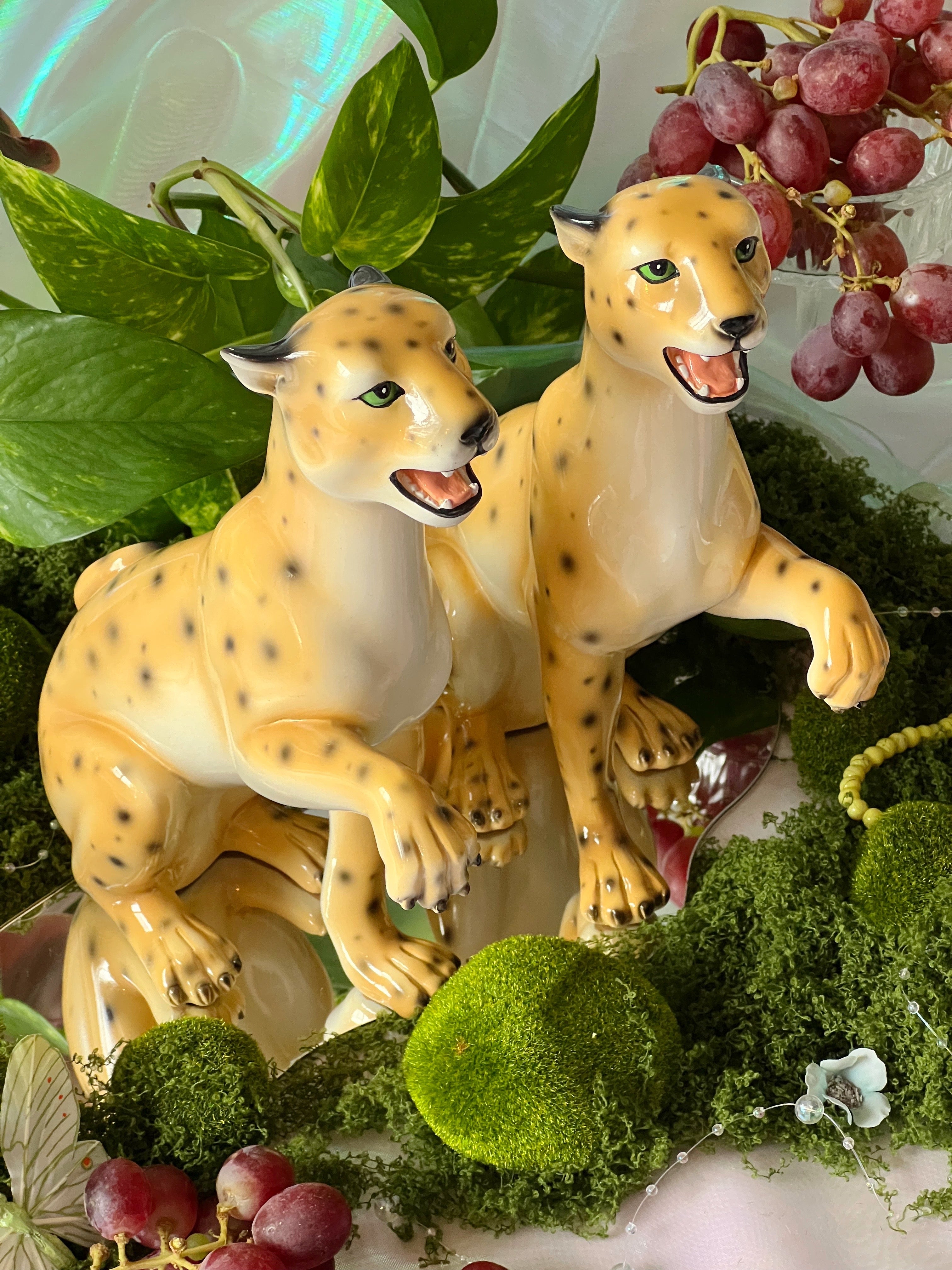 matching leopard statues