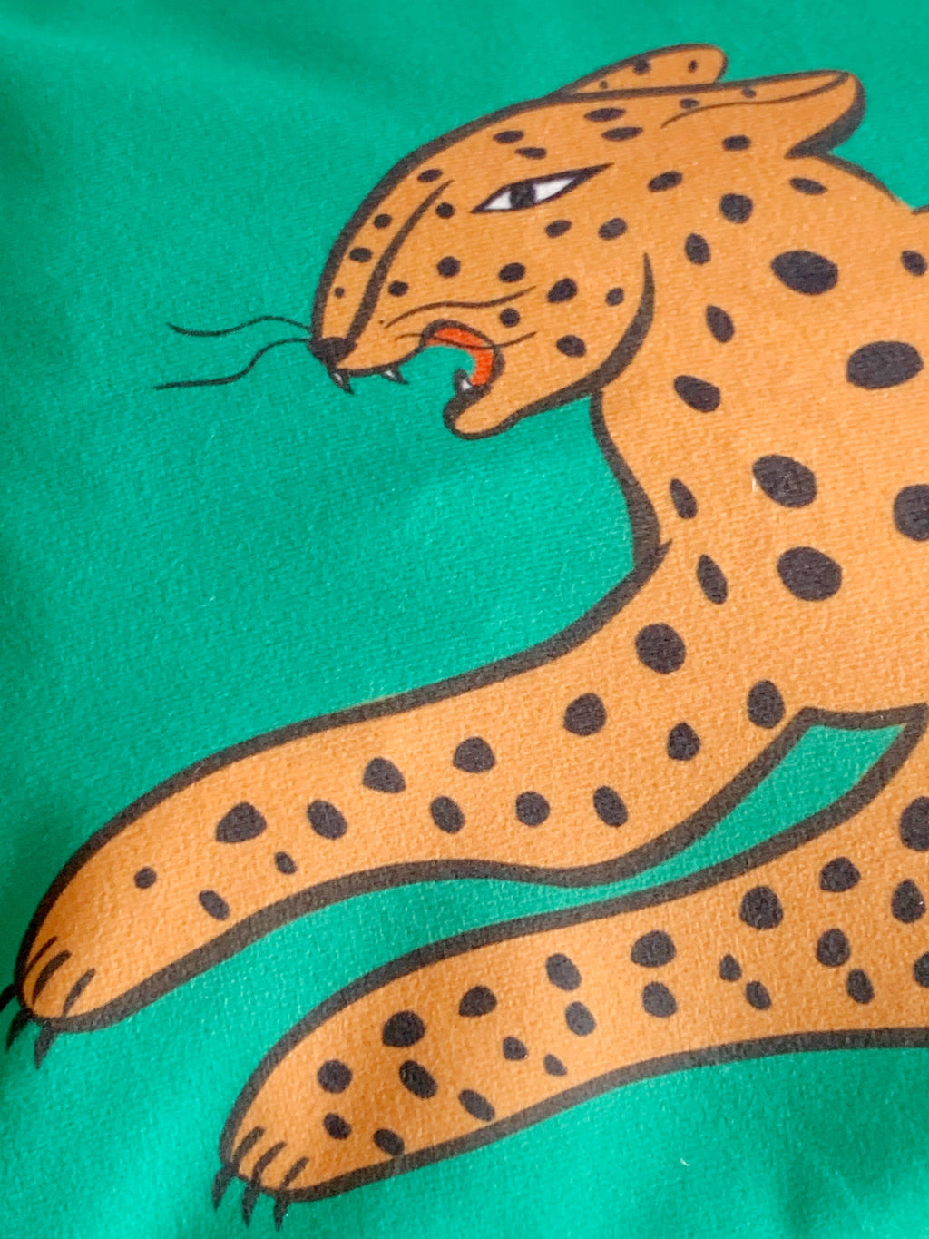 close up leaping leopard cushion cover