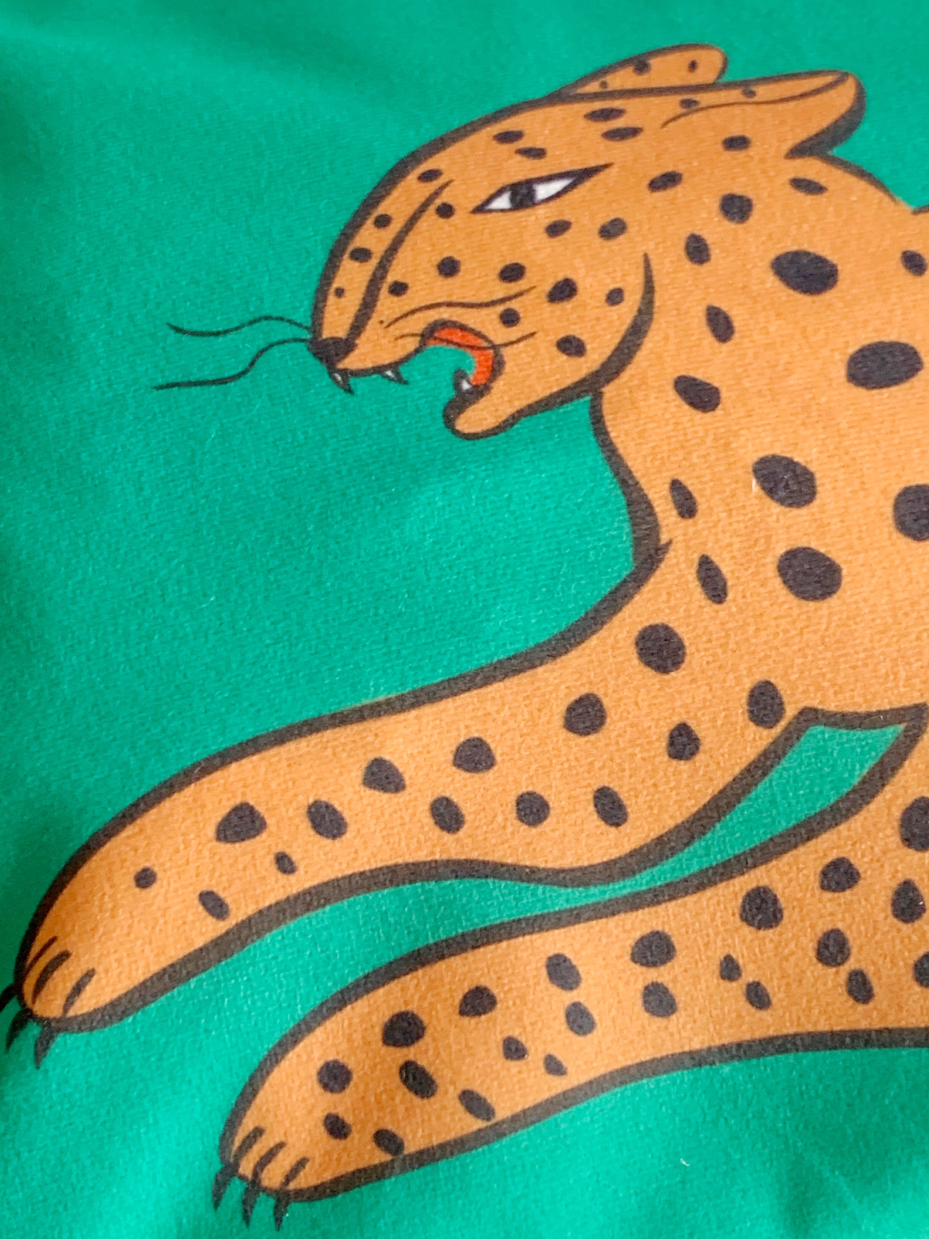 close up leaping leopard cushion cover