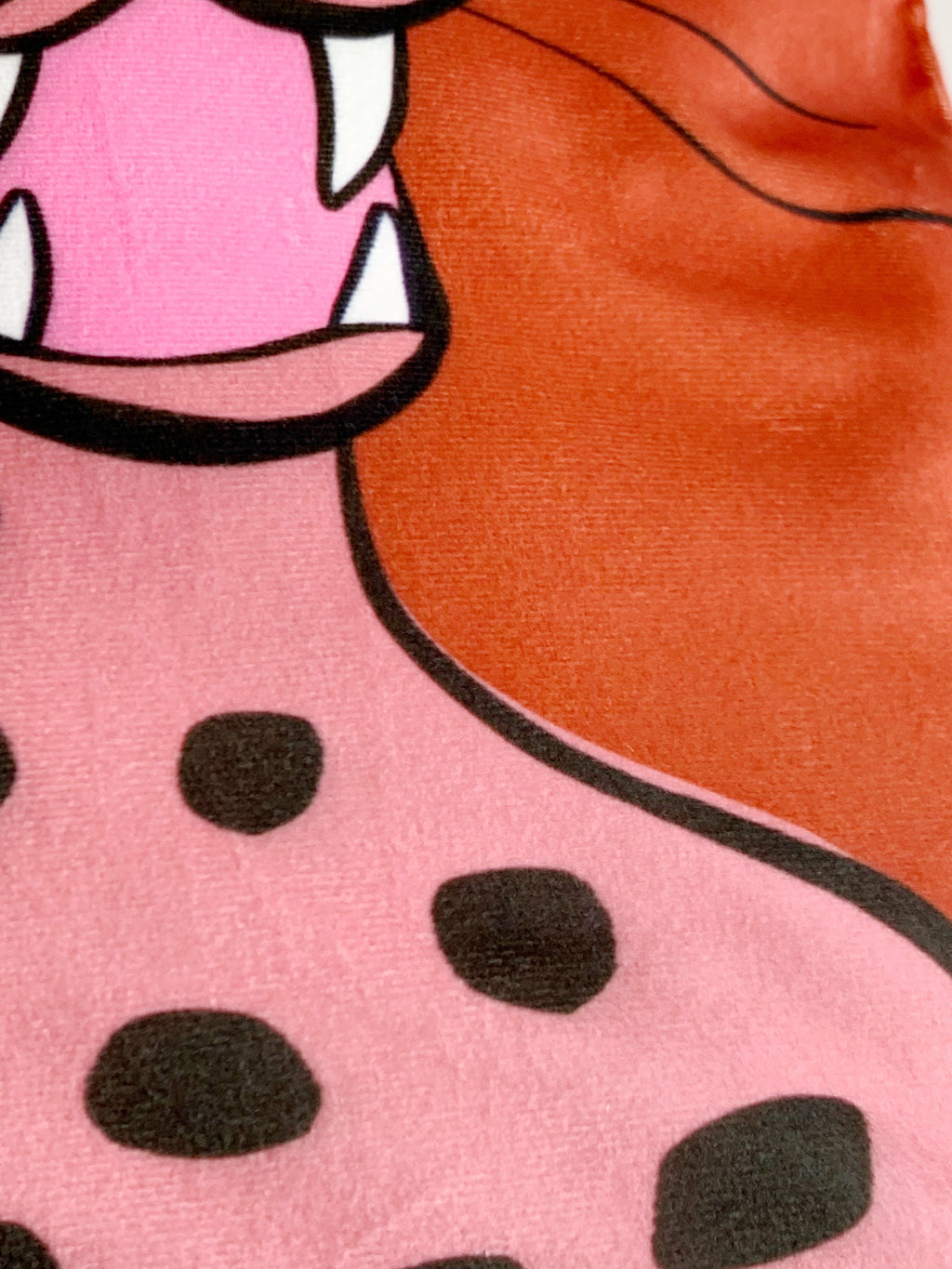 close up rust leopard cushion cover